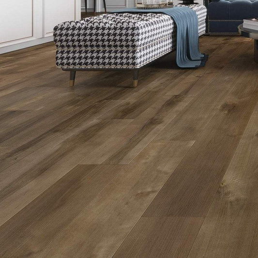 Living room with modern light brown hardwood flooring and houndstooth bench