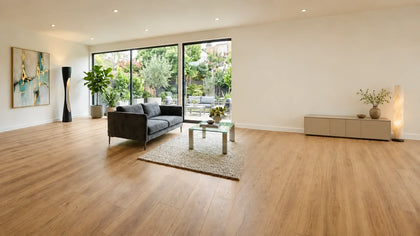 Modern bathroom with natural hardwood floors, freestanding bathtub and large windows
