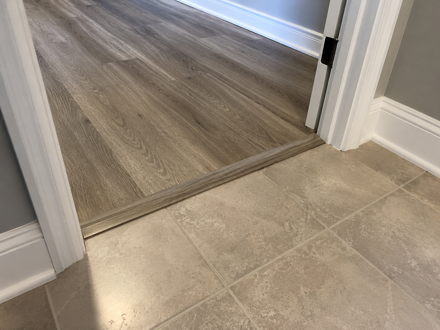 Natural oak hardwood stair tread with rounded edge and visible wood grain