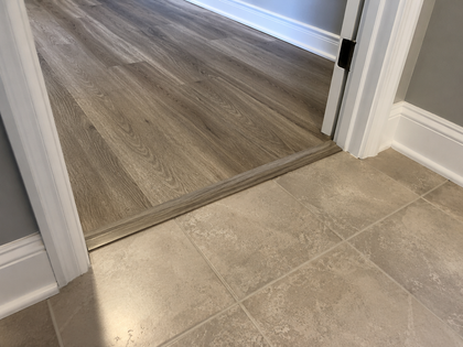 Natural oak hardwood stair tread with rounded edge and visible wood grain